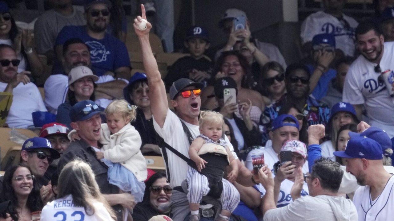 Dodgers Fan Catches Foul Ball While Holding His Baby and a Beer