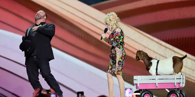 At the ACM Awards, Dolly Parton joked about a Garth Brooks trio while bringing a goat on stage. 